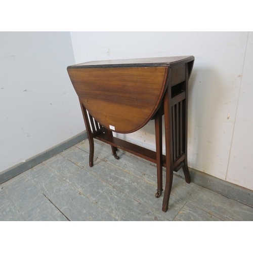 780 - An Edwardian mahogany oval Sutherland table strung with ebony, on tapering square supports with bras... 