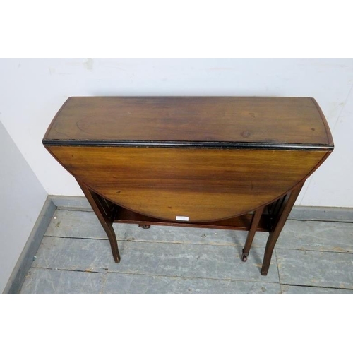 780 - An Edwardian mahogany oval Sutherland table strung with ebony, on tapering square supports with bras... 