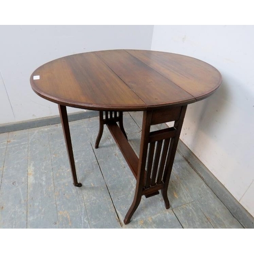 780 - An Edwardian mahogany oval Sutherland table strung with ebony, on tapering square supports with bras... 