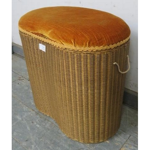 794 - A vintage Lloyd Loom kidney shaped laundry basket, the lid upholstered in burnt orange velvet materi... 