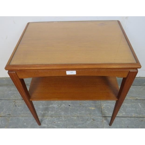 800 - A mid-century Danish two-tier teak side table, having inset loose glass top, on tapered square suppo... 