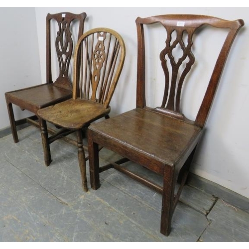 802 - A matched pair of Georgian oak country chairs, with shaped and pierced backsplats, on square support... 