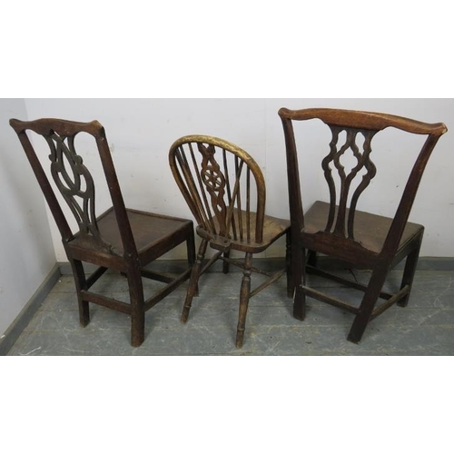 802 - A matched pair of Georgian oak country chairs, with shaped and pierced backsplats, on square support... 