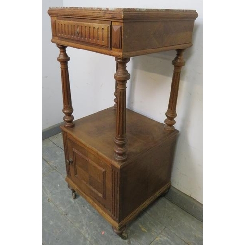 805 - A 19th century French fruitwood two-tier bedside cabinet, the rouge marble top above single frieze d... 