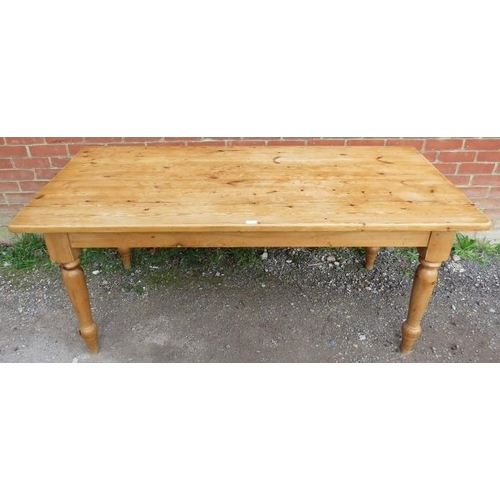 812 - A vintage pine kitchen table, originally purchased by the vendor from Heal’s, on tapering turned sup... 