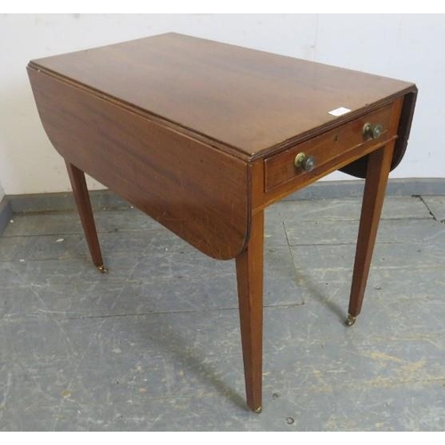 816 - A George III mahogany Pembroke table, having reeded edge, with one cock-beaded drawer and one dummy ... 