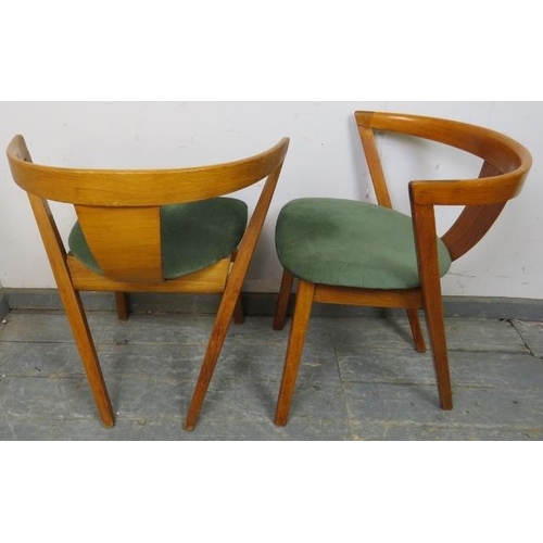 818 - A pair of mid-century beech tub chairs by Greaves & Thomas, the seats covered in emerald green velve... 