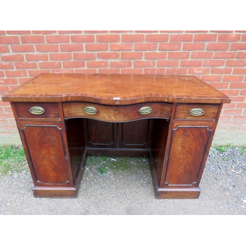 830 - A Regency Period mahogany serpentine fronted sideboard, crossbanded and strung with ebony and boxwoo... 