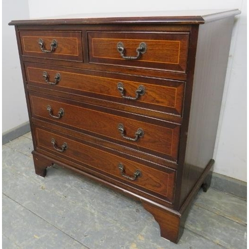 834 - A reproduction mahogany chest in the Georgian taste, crossbanded and strung with satinwood, housing ... 