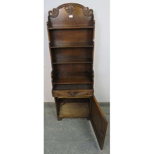 835 - An antique oak tall narrow waterfall bookcase, having relief carved decoration in the 17th century t... 