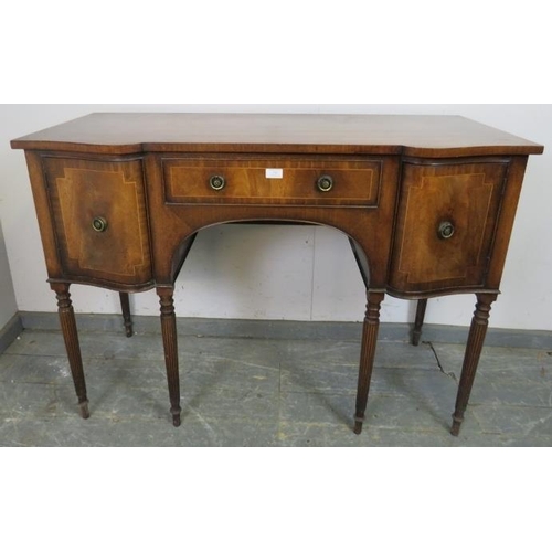 836 - A vintage mahogany reverse breakfront sideboard in the Regency taste, crossbanded and strung with sa... 