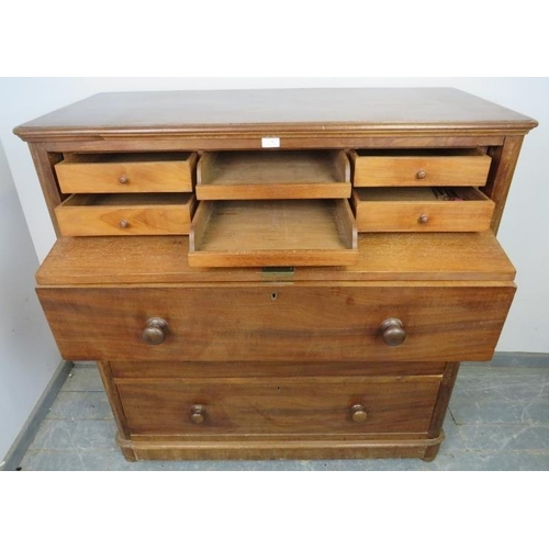 840 - An unusual Victorian mahogany chest, the top section with fall front, opening onto a fitted interior... 