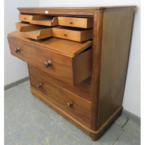 840 - An unusual Victorian mahogany chest, the top section with fall front, opening onto a fitted interior... 