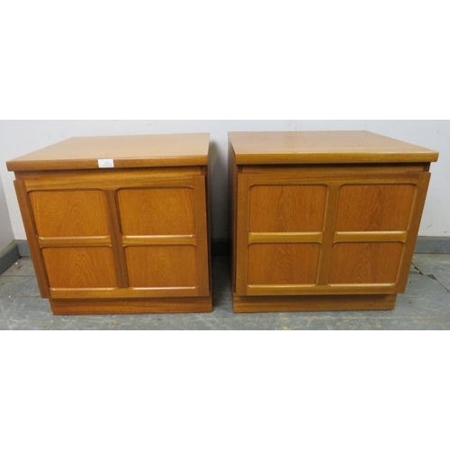 841 - A pair of mid-century teak bedside cabinets by Parker Knoll, the doors with lattice mouldings openin... 