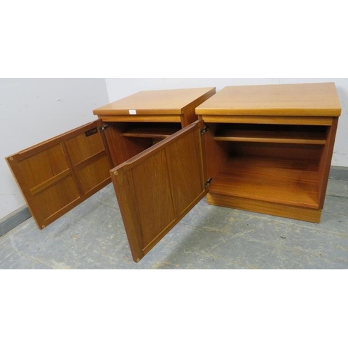 841 - A pair of mid-century teak bedside cabinets by Parker Knoll, the doors with lattice mouldings openin... 