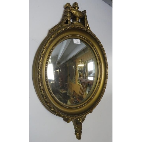 844 - A vintage convex wall mirror in the Regency taste, within an ornate gilt surround, the cornice in th... 