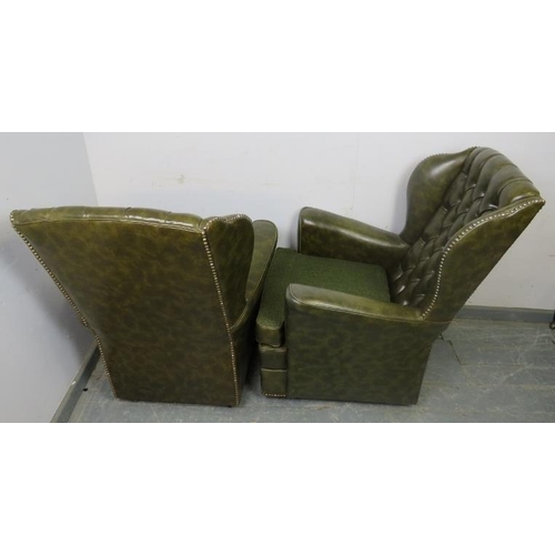 867 - A pair of vintage Chesterfield style wingback armchairs, upholstered in faux green leather with bras... 