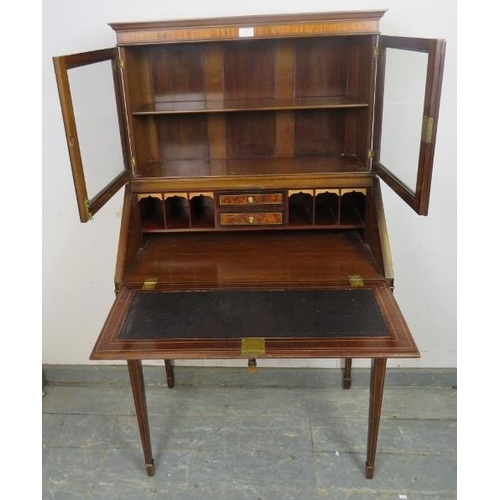 869 - An Edwardian mahogany bonheur du jour, crossbanded with walnut and boxwood and ebony strung, the top... 