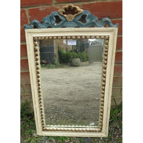 877 - A vintage painted parcel gilt wall mirror, having carved and pierced cornice and beaded surround. 
H... 