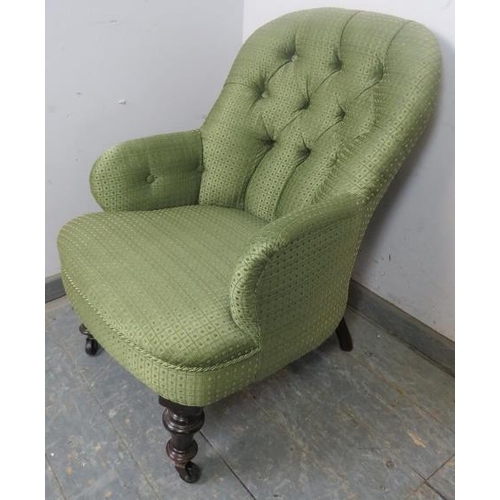 880 - A Victorian mahogany bedroom chair, upholstered in buttoned green damask, on turned supports with ca... 