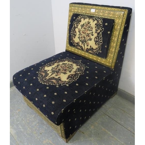 885 - A highly decorative ottoman seat, upholstered in navy material with tapestry decoration, the back an... 