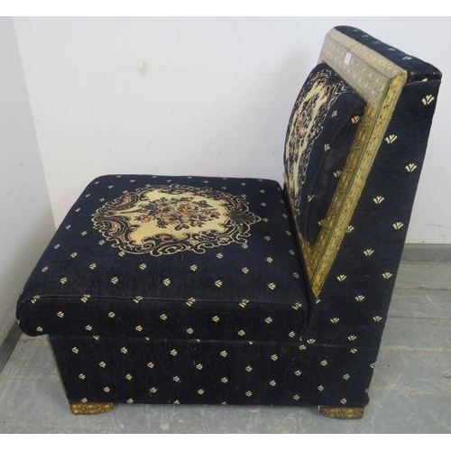 885 - A highly decorative ottoman seat, upholstered in navy material with tapestry decoration, the back an... 