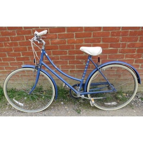 888 - A vintage 1980s Raleigh Chiltern ladies’ bicycle in cornflower blue with white vinyl seat on a 20” f... 