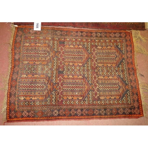 908 - Two Rugs - An early 20th century rug, six repeat pattern motifs. 123cm x 90cm (approx).
Condition re... 