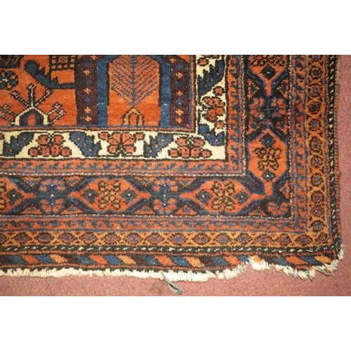 918 - A mid/late 20th century Persian rug, central pattern design in cream, black, blue & brown. 177cm x 1... 