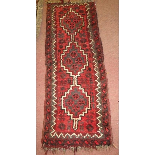 919 - Four assorted small rugs, Afghan/Persian. Smallest 75cm x 50cm (approx). Largest 130cm x 44cm (appro... 