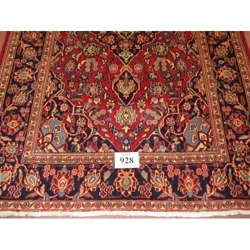 928 - Central Persian Kashan rug, blue on red ground. 195cm x 132cm (approx).
Condition report: No issues.