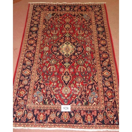 928 - Central Persian Kashan rug, blue on red ground. 195cm x 132cm (approx).
Condition report: No issues.