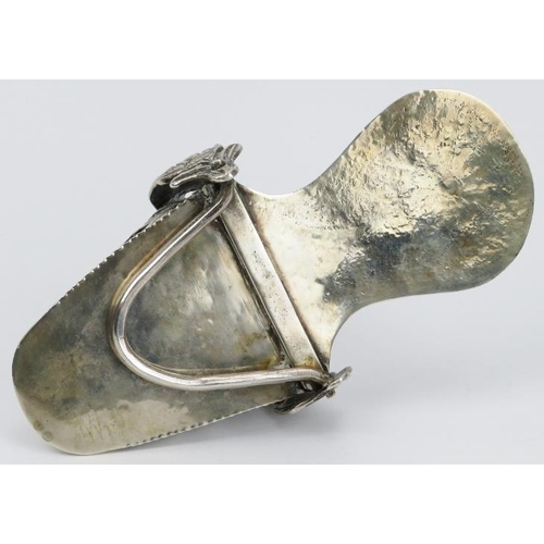 105 - A Peruvian embossed white metal ladies stirrup, 18th/19th century. Of slipper form, decorated with f... 