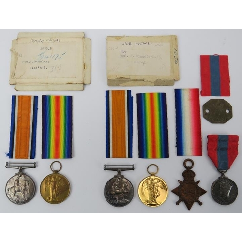 117 - Militaria: Two groups of WWI British Military medals. A group of four medals comprising The 1914 - 1... 