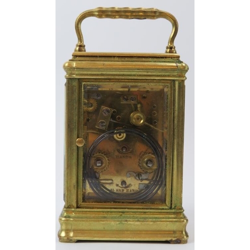 118 - A Charles Frodsham brass repeater carriage clock with alarm, late Victorian/Edwardian period. Dial s... 