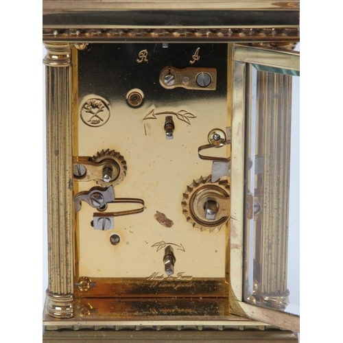 122 - A French L'Epee brass carriage clock, 20th century. Frame with corner columns, dial signed ‘L’Epee F... 