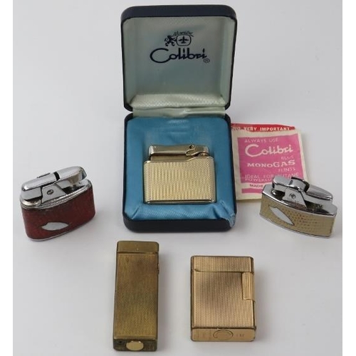 143 - A group of vintage lighters. Makers include Ronson, S.T. Dupont, Dunhill and Colibri. (5 items).
Con... 