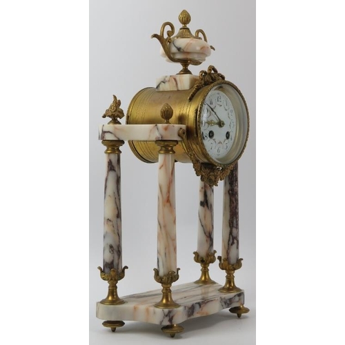 148 - A French Louis XVI style gilt metal and marble portico mantel clock, late 19th/early 20th century. W... 