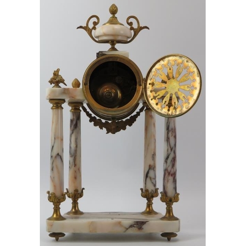 148 - A French Louis XVI style gilt metal and marble portico mantel clock, late 19th/early 20th century. W... 