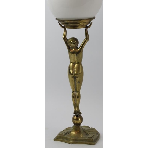 151 - An Art Deco gilt brass ‘Diana’ table lamp, early 20th century. With later added spherical glass shad... 