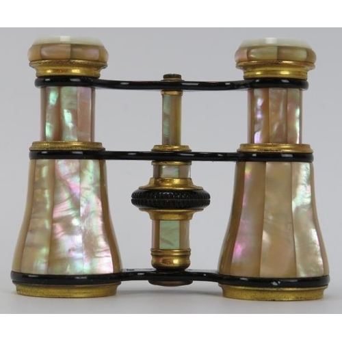 152 - A pair of gilt and enamalled mother pearl opera glasses, 19th/early 20th century. With black leather... 