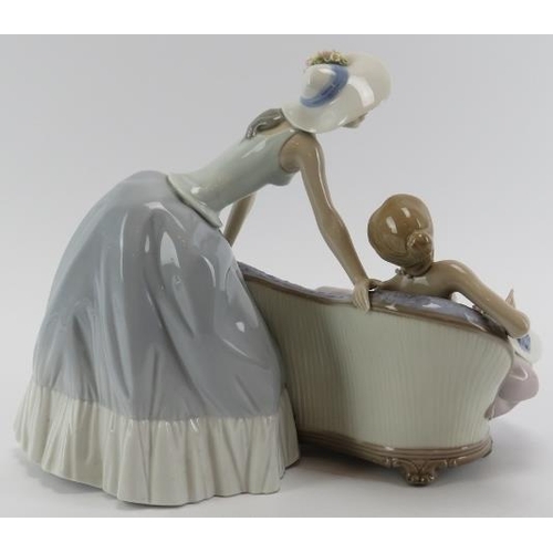 157 - A large Lladro porcelain figural group entitled ‘Debutantes’. Model number: 5486. 21.5 cm height.
Co... 