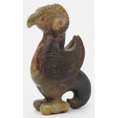 16 - A Chinese archaistic jade carving of a zoomorphic creature. Formed as a bird with rams horns, incise... 