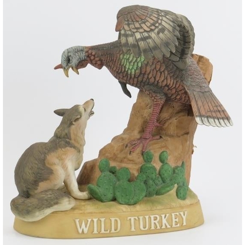 17 - An Austin Nichols ‘Wild Turkey’ bourbon whiskey figural ceramic decanter with contents. Modelled as ... 