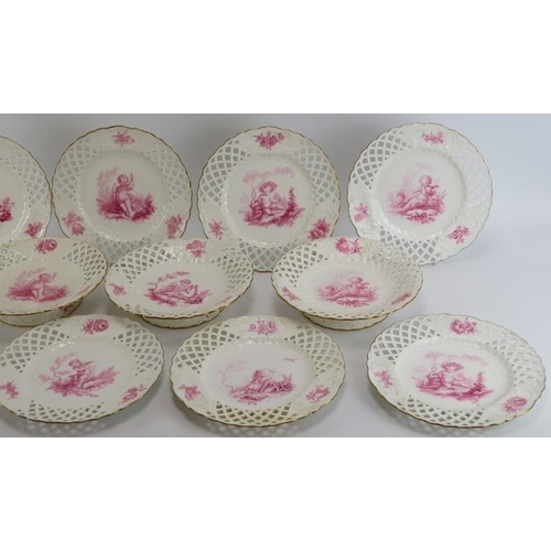 173 - A group of Minton porcelain dinner plates and comports. Comprising nine plates, four comports and a ... 