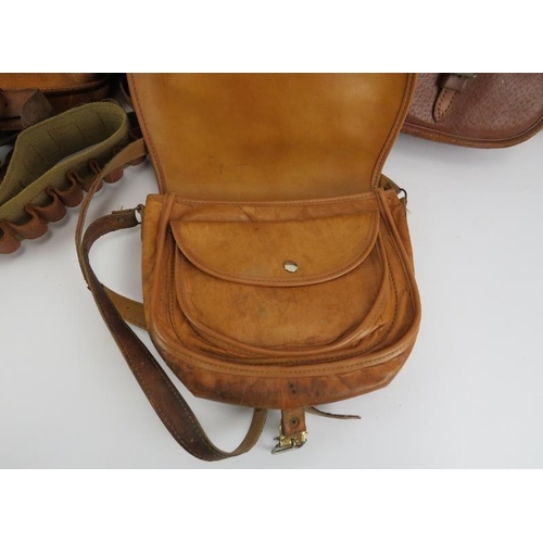 184 - Four brown leather hunting and cartridge bags and a cartridge belt. (5 items).
Condition report: Som... 