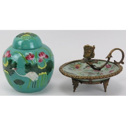 2 - A Chinese gilt metal mounted celadon porcelain chamber stick and a ginger jar, 19th/20th century. Co... 