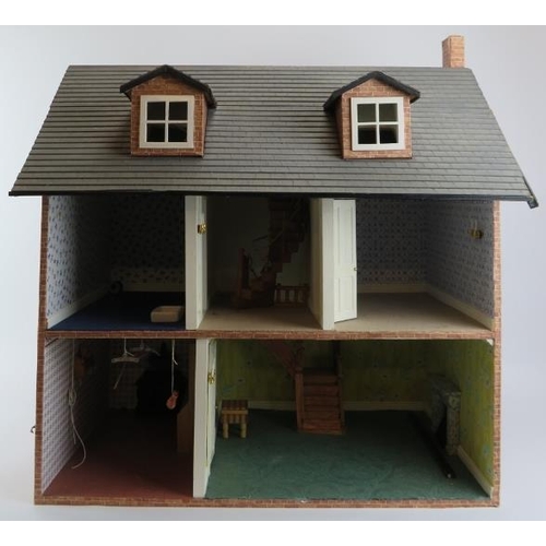 207 - Toys and Models: A vintage Georgian style doll house. Box of furnishings included (See additional im... 