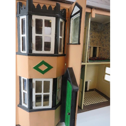 208 - Toys and Models: A vintage Victorian style doll house. Box of furnishings included (See additional i... 