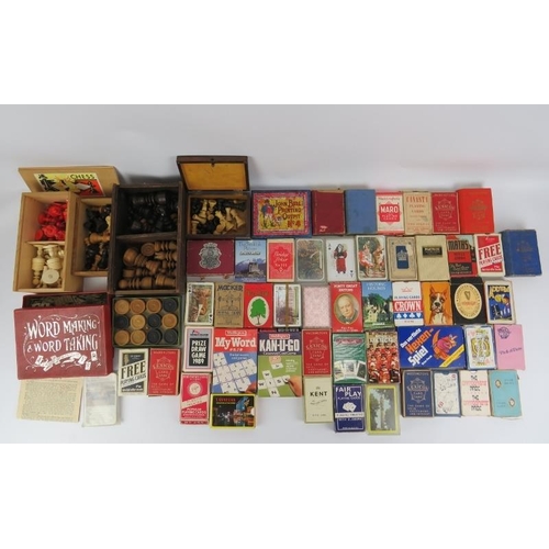 216 - A large vintage collection of gaming cards, chess pieces and other games. (Quantity).
Condition repo... 